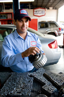 Image of AAMCO Mechanic Repairing a clutch