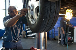 Image of Brakes being repaired by AAMCO Mechanic
